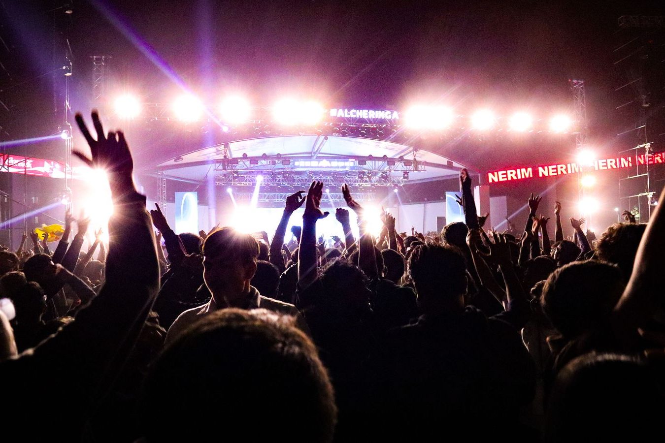 An audience facing a lit stage in a large theatre, the kind of show night the Entertainment Centre hosts