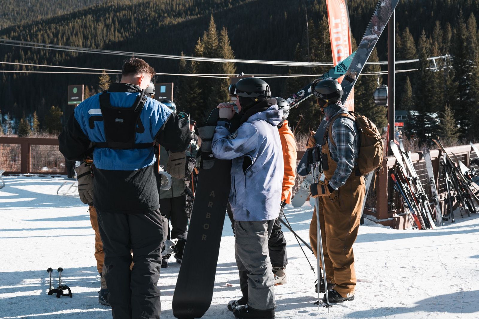 Skiers relaxing in a busy ski chalet cafeteria, the break that anchors a long day on the hill