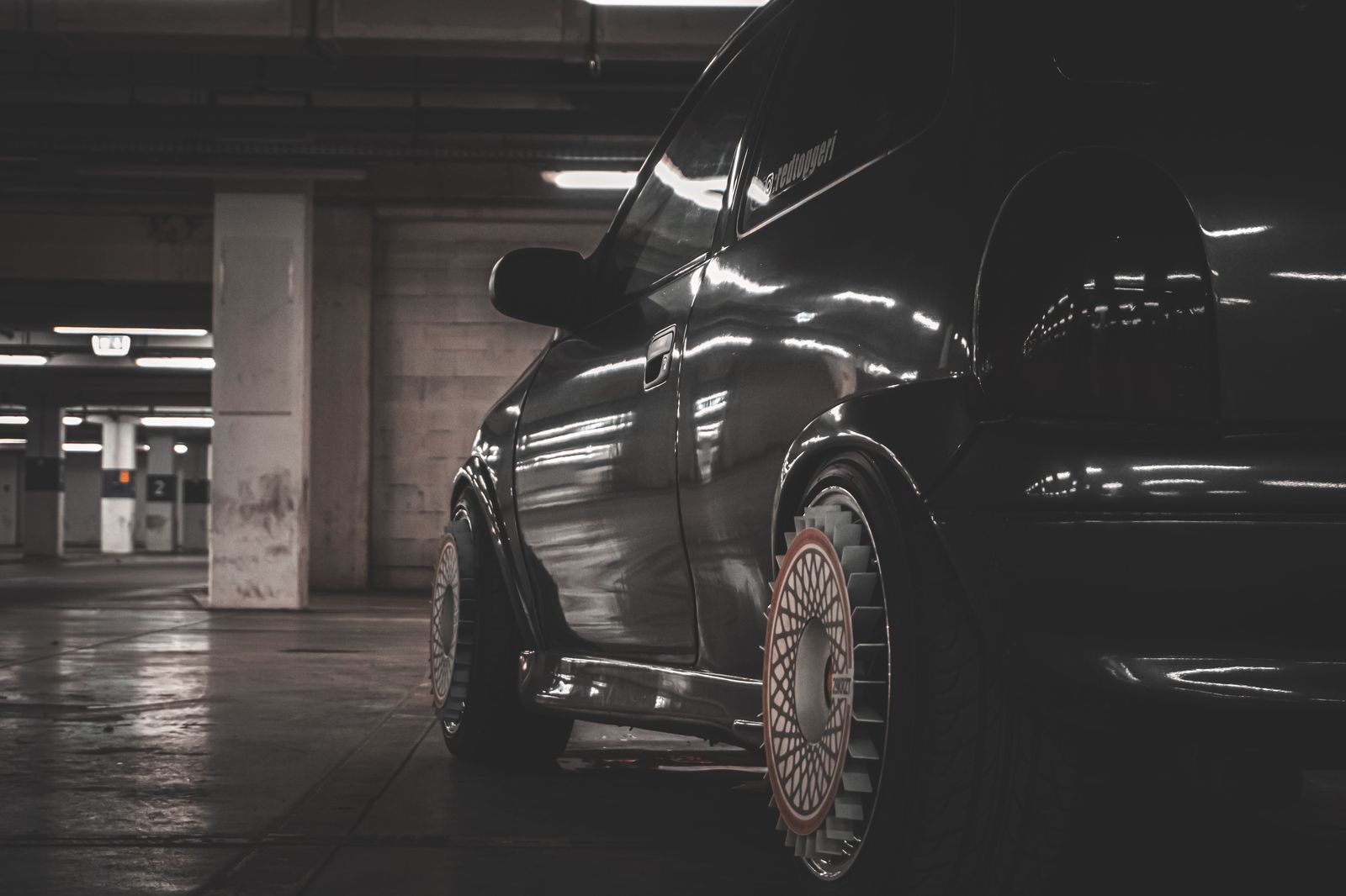 A black limousine waiting outside a Barrie restaurant at night while the group finishes dinner