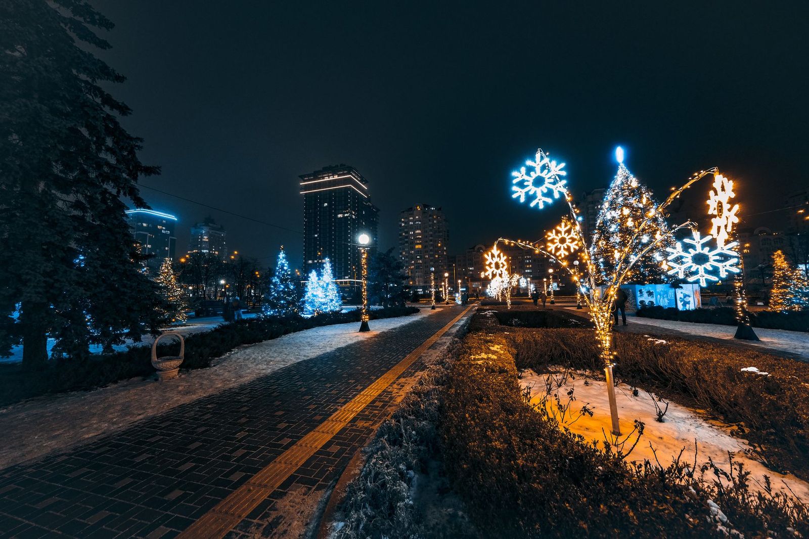 Festive lights glowing at dusk, a Muskoka winter evening a chauffeur makes simple