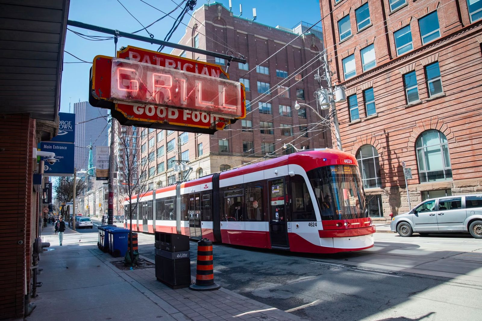 A streetcar passing along a downtown Toronto street