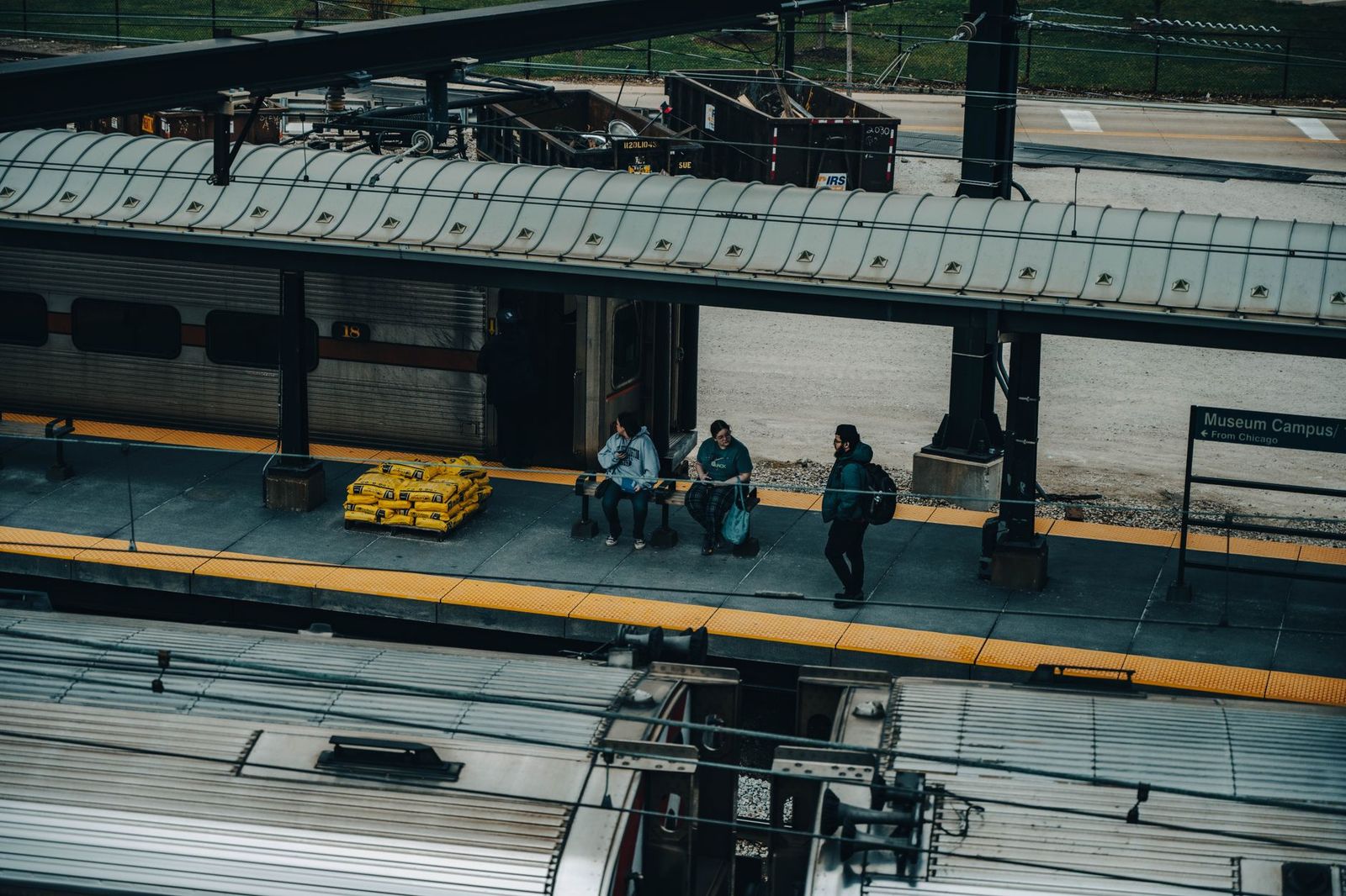 Commuters boarding at a GO station platform on the Barrie line