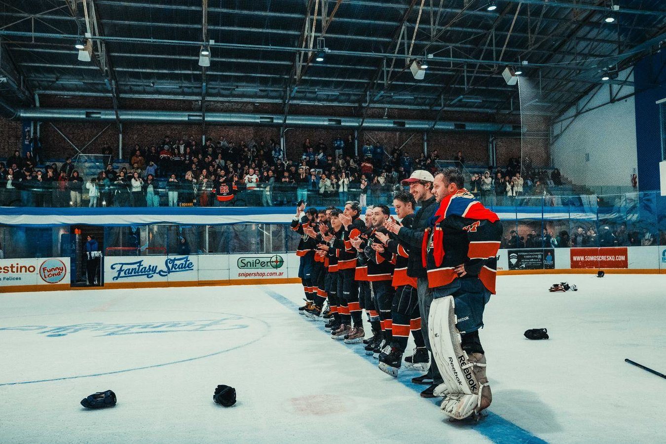 A packed hockey arena on game night