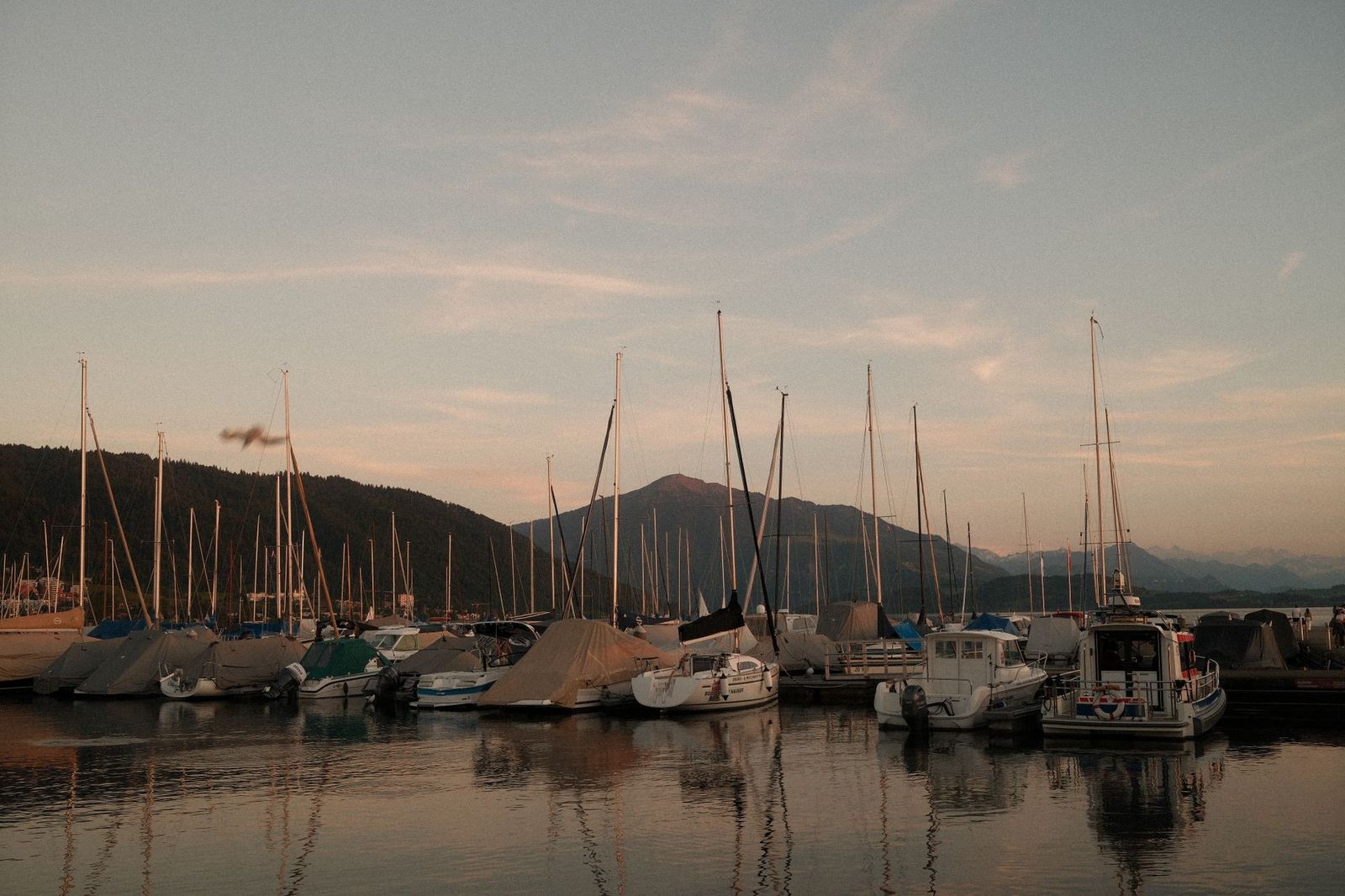Barrie's Kempenfelt Bay waterfront at sunset with boats in the marina