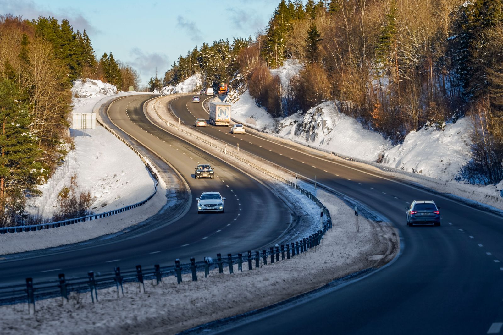 Highway 400 at dusk in winter, where the margin a chauffeur adds is worth the most