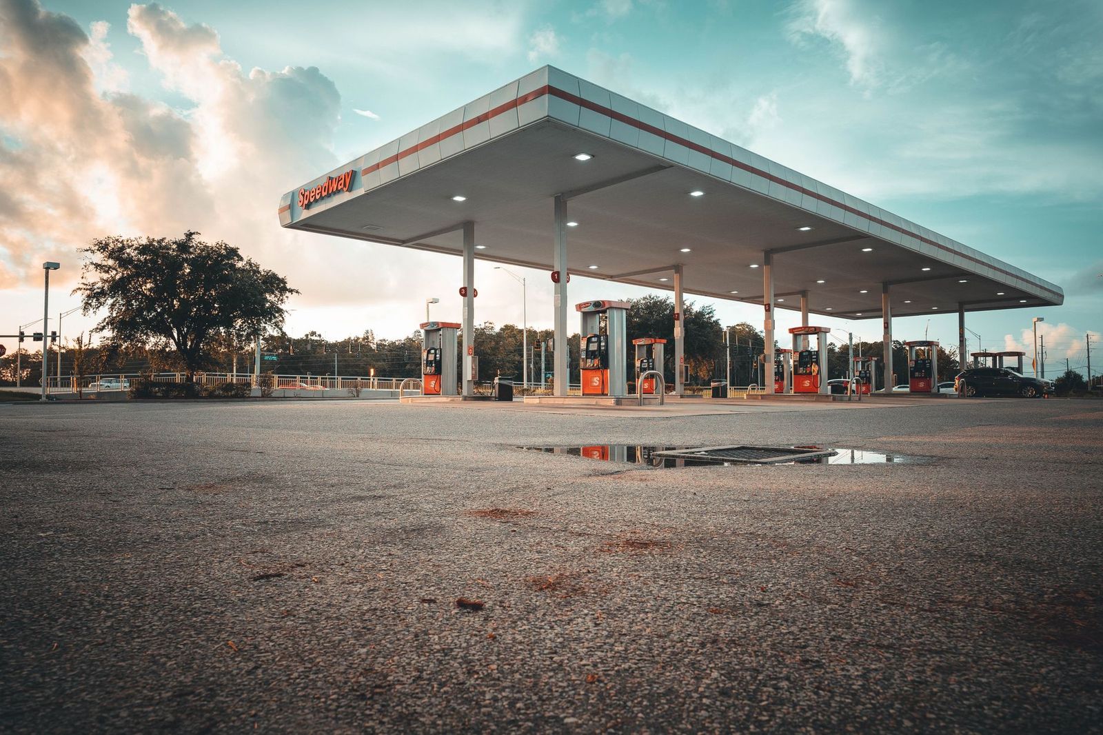 Highway service centre at dusk where long-distance passengers stop for coffee
